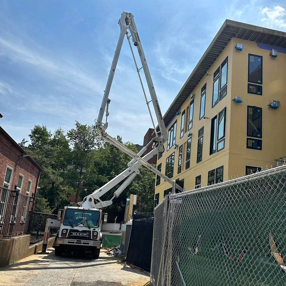 concrete boom pump on a job site